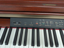 Load image into Gallery viewer, Yamaha Clavinova CLP-240 Digital Piano in mahogany stock nr 25514
