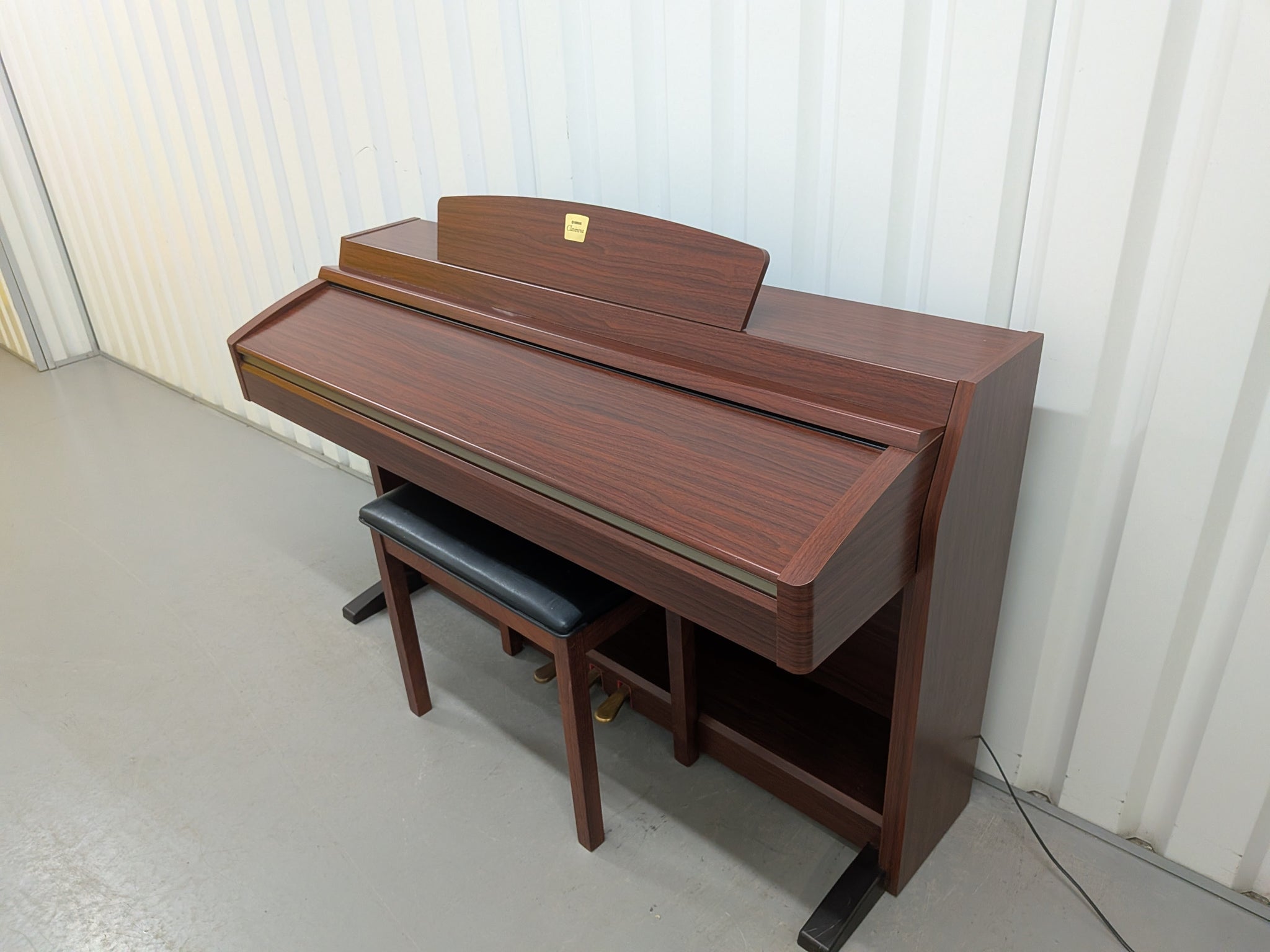 Yamaha Clavinova CLP-230 digital piano and stool in mahogany stock