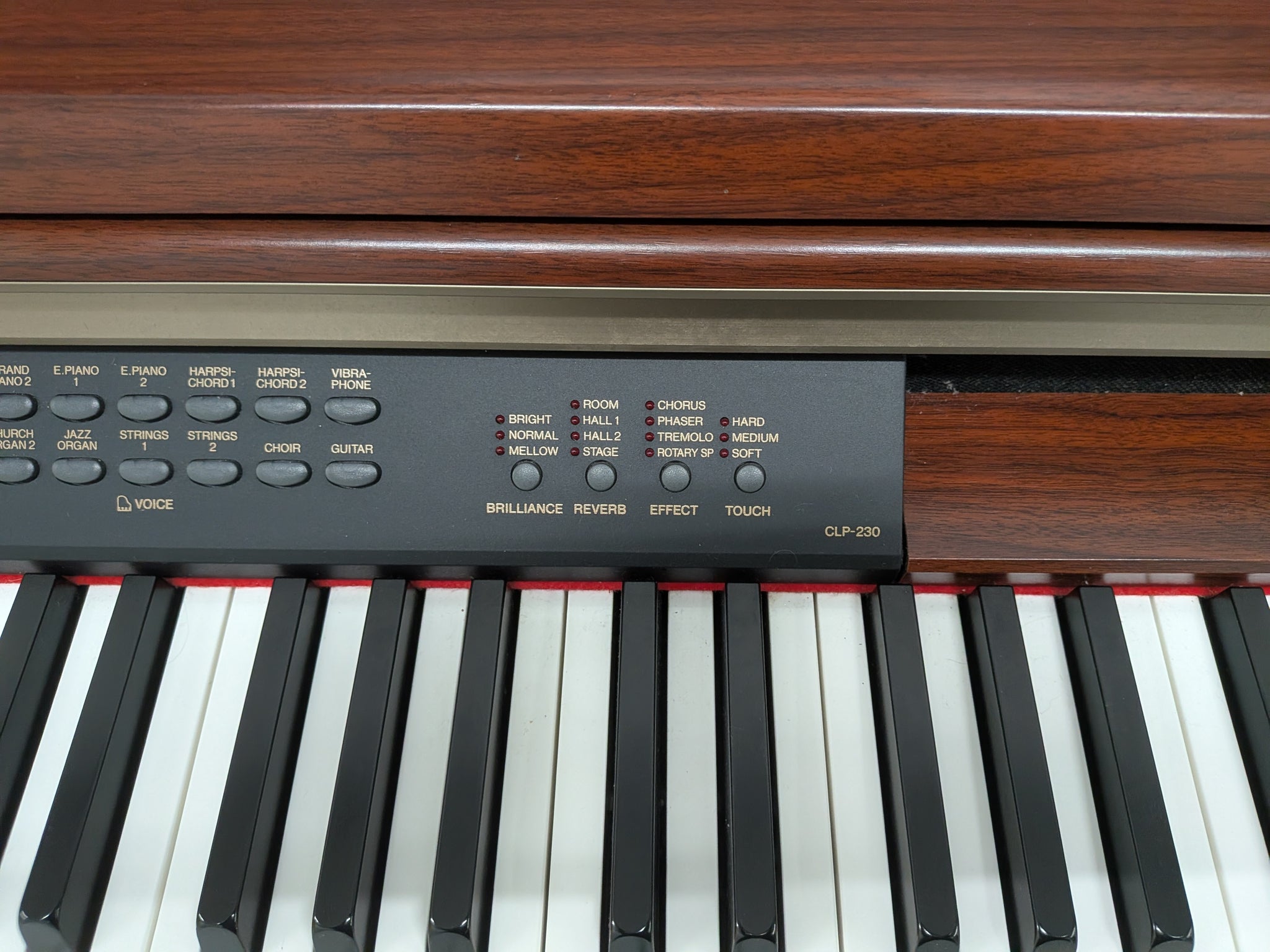 Yamaha Clavinova CLP-230 digital piano and stool in mahogany stock