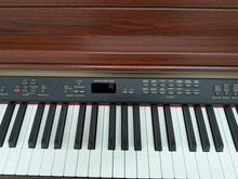 Load image into Gallery viewer, Yamaha Clavinova CLP-230 digital piano and stool in mahogany stock #25551
