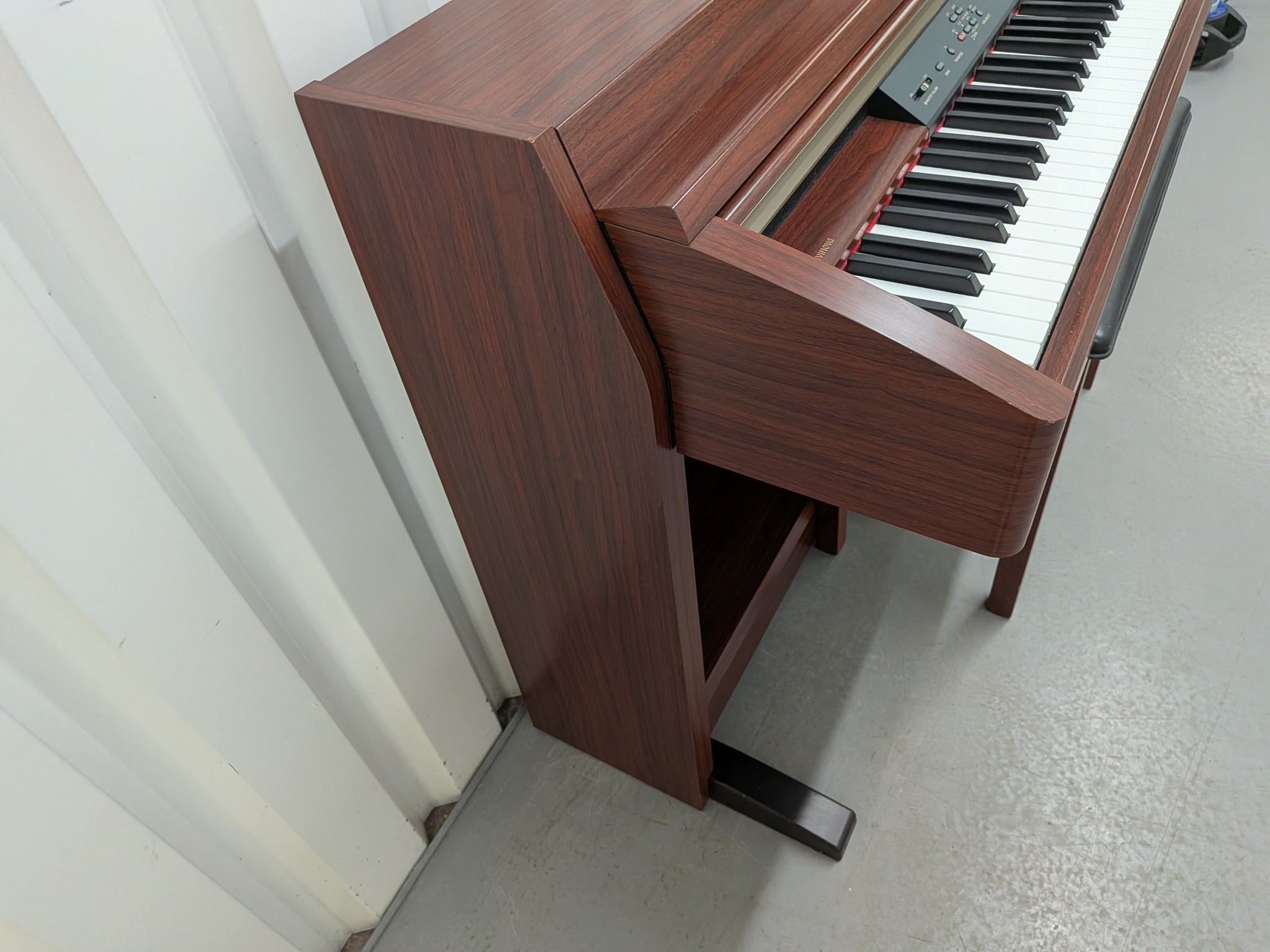 Yamaha Clavinova CLP-230 digital piano and stool in mahogany stock