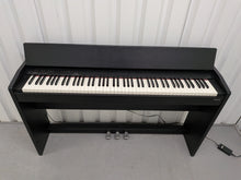 Load image into Gallery viewer, Roland F130R Digital Piano in black with matching colour stool stock # 25570
