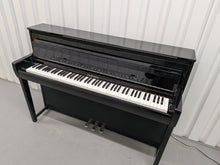 Load image into Gallery viewer, Yamaha Clavinova CLP-785 digital piano in polished black finish stock #25576
