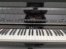 Load image into Gallery viewer, Yamaha Clavinova CLP-785 digital piano in polished black finish stock #25576
