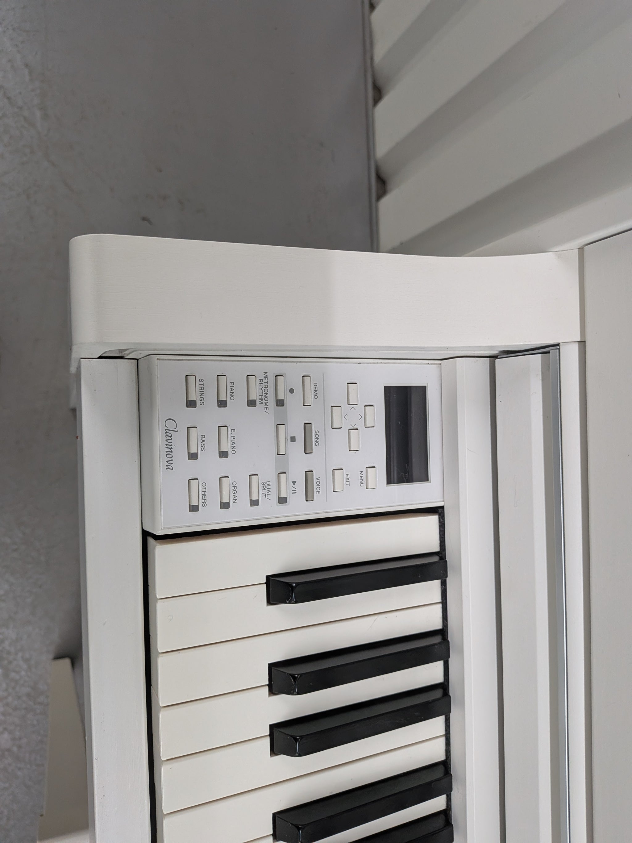 Yamaha Clavinova CLP-545 digital piano in satin white with stool