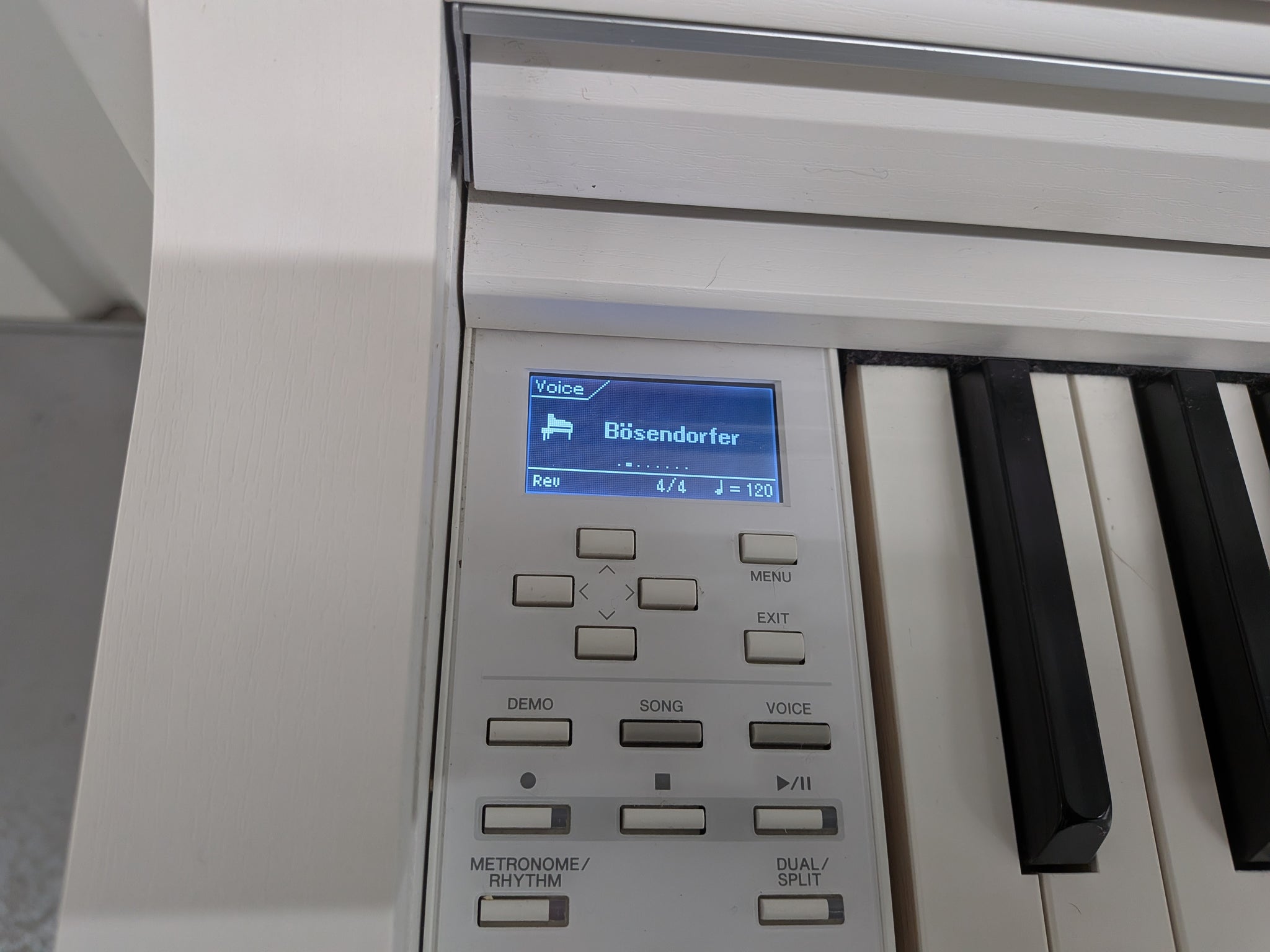 Yamaha Clavinova CLP-545 digital piano in satin white with stool