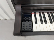 Load image into Gallery viewer, Yamaha Clavinova CLP-575 digital piano and stool in dark rosewood finish stock #26002
