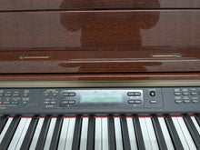 Load image into Gallery viewer, Yamaha Clavinova CLP-280 in Polished Mahogany SPARES / REPAIR - SOLD AS SEEN WITH NO RETURNS
