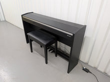 Load image into Gallery viewer, Roland F140R Digital Piano in satin black slim line space saver stock # 26052
