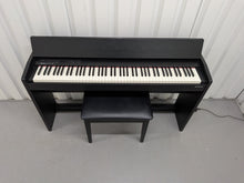 Load image into Gallery viewer, Roland F140R Digital Piano in satin black slim line space saver stock # 26052
