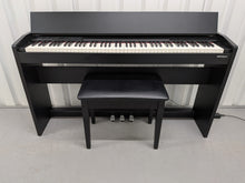 Load image into Gallery viewer, Roland F140R Digital Piano in satin black slim line space saver stock # 26052
