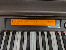 Load image into Gallery viewer, Casio Celviano AP-80R Digital Piano / arranger in rosewood stock # 26056

