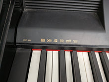 Load image into Gallery viewer, Yamaha Clavinova CVP-109PE Digital Piano and stool in glossy polished black stock #26049
