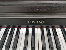 Load image into Gallery viewer, CASIO CELVIANO AP-200 DIGITAL PIANO AND STOOL IN DARK ROSEWOOD stock #26059
