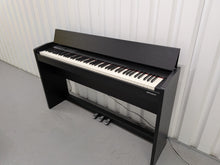 Load image into Gallery viewer, Roland F140R Digital Piano in satin black slim line space saver stock # 26060
