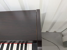 Load image into Gallery viewer, Yamaha Arius YDP-131 Digital Piano and stool in rosewood finish stock nr 26066
