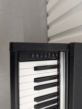 Load image into Gallery viewer, Yamaha Arius YDP-142 Digital Piano in satin black stock #26081
