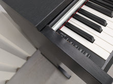 Load image into Gallery viewer, Yamaha Arius YDP-142 Digital Piano in satin black stock #26081
