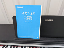 Load image into Gallery viewer, Yamaha Arius YDP-142 Digital Piano in satin black stock #26081
