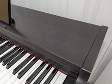 Load image into Gallery viewer, Yamaha Arius YDP-131 Digital Piano and stool in rosewood finish stock nr 26094
