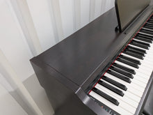 Load image into Gallery viewer, Yamaha Arius YDP-131 Digital Piano and stool in rosewood finish stock nr 26094
