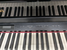 Load image into Gallery viewer, Roland HP508 digital piano and stool in polished glossy black stock number 26096
