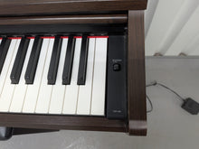 Load image into Gallery viewer, Yamaha Arius YDP-140 digital piano and stool dark rosewood finish stock # 26107
