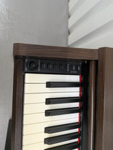 Load image into Gallery viewer, Yamaha Arius YDP-140 digital piano and stool dark rosewood finish stock # 26107
