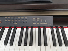 Load image into Gallery viewer, Yamaha Clavinova CLP-120 Digital Piano and stool in dark rosewood stock #26113
