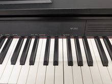 Load image into Gallery viewer, Casio Celviano AP-250 digital piano  in satin black finish stock number PX01
