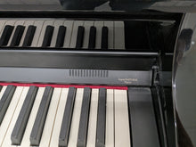 Load image into Gallery viewer, Roland HP506 Digital Piano glossy black wooden action keys + stool Stock nr 26124

