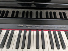 Load image into Gallery viewer, Roland HP506 Digital Piano glossy black wooden action keys + stool Stock nr 26124
