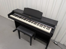Load image into Gallery viewer, Roland RP501R digital piano and stool in satin black finish stock number 26163
