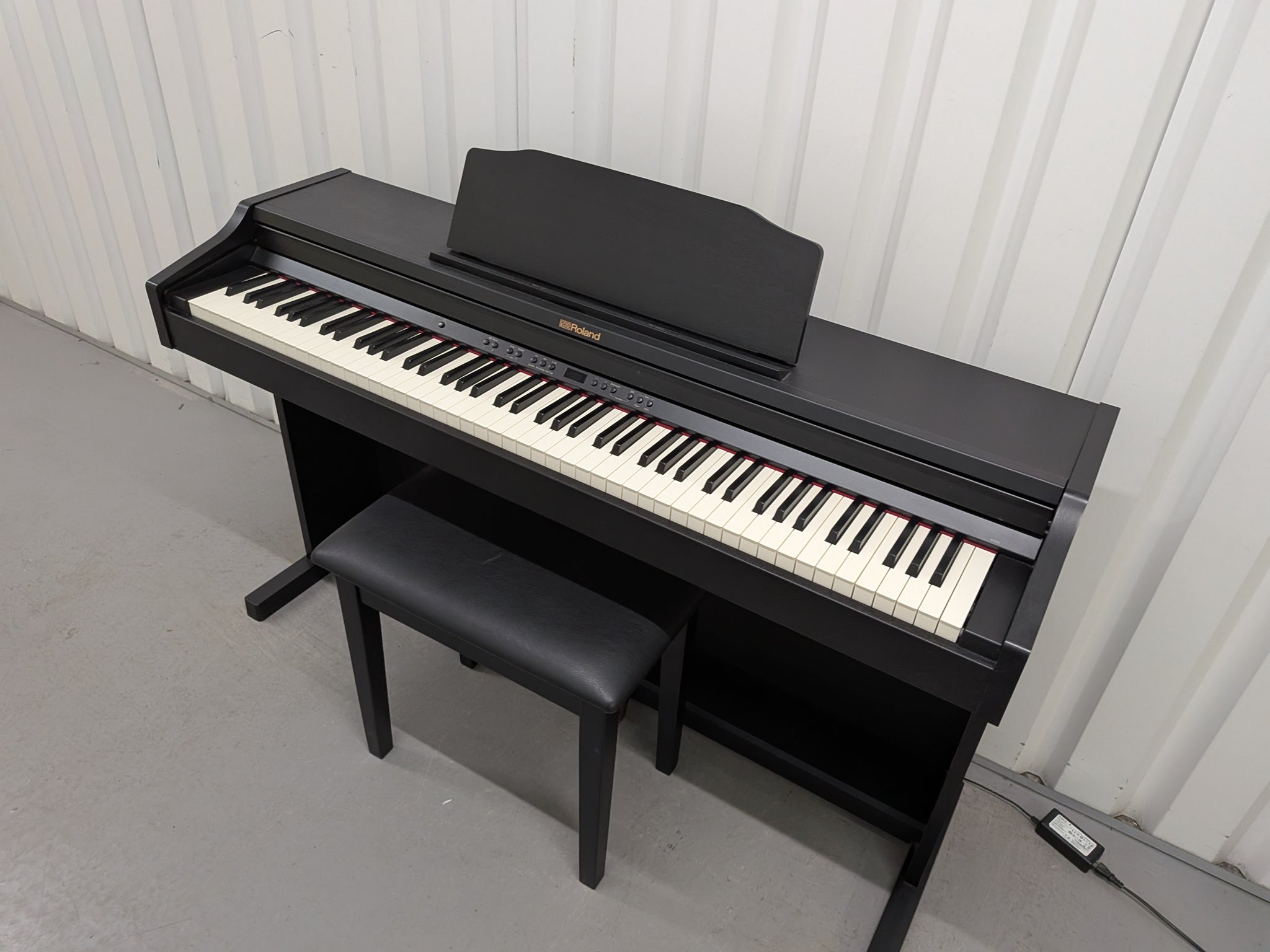 Roland RP501R digital piano and stool in satin black finish stock