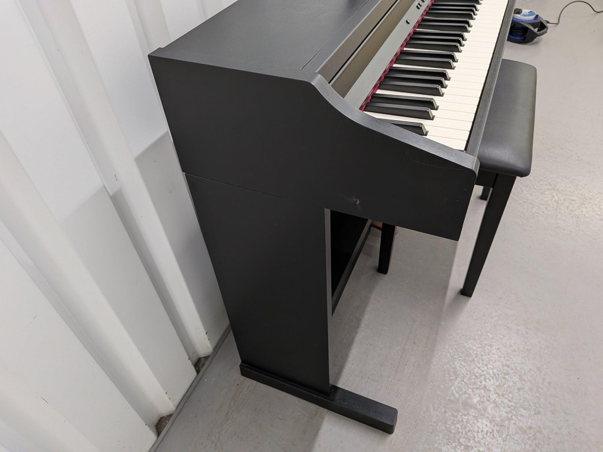 Roland RP501R digital piano and stool in satin black finish stock