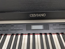 Load image into Gallery viewer, Casio Celviano AP-620 Digital Piano in satin black, 128 note polyphony stock # 26179
