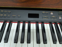 Load image into Gallery viewer, Yamaha Clavinova CLP-880 digital piano and stool in mahogany finish stock number 26206
