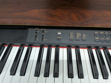 Load image into Gallery viewer, Yamaha Clavinova CLP-880 digital piano and stool in mahogany finish stock number 26206
