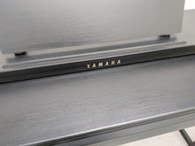 Load image into Gallery viewer, Yamaha clavinova CLP-525 digital piano in satin black colour stock # 26224
