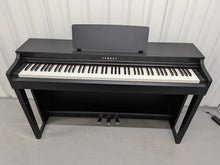 Load image into Gallery viewer, Yamaha clavinova CLP-525 digital piano in satin black colour stock # 26224
