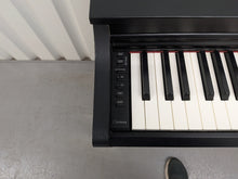 Load image into Gallery viewer, Yamaha clavinova CLP-525 digital piano in satin black colour stock # 26224
