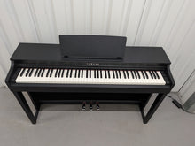 Load image into Gallery viewer, Yamaha clavinova CLP-525 digital piano in satin black colour stock # 26224
