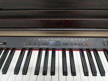 Load image into Gallery viewer, Yamaha Clavinova CLP-930 Digital Piano in dark rosewood stock #26229
