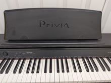 Load image into Gallery viewer, Casio Privia PX-750 Slim Digital Piano in satin black space saving stock # 26235
