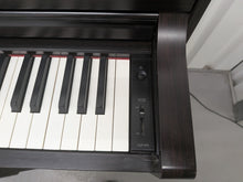 Load image into Gallery viewer, Yamaha Clavinova CLP-575 digital piano and stool in dark rosewood finish stock #26240

