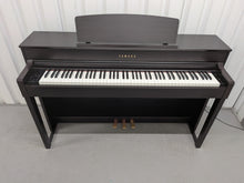 Load image into Gallery viewer, Yamaha Clavinova CLP-575 digital piano and stool in dark rosewood finish stock #26240
