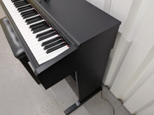 Load image into Gallery viewer, Yamaha Arius YDP-144 digital piano and stool in satin black stock #26247
