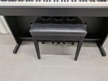 Load image into Gallery viewer, Yamaha Arius YDP-144 digital piano and stool in satin black stock #26247
