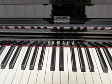 Load image into Gallery viewer, Yamaha Clavinova CLP-585 digital piano and stool in glossy black  stock #26255
