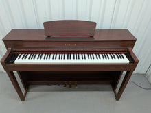 Load image into Gallery viewer, Yamaha Clavinova CLP-535 digital piano in mahogany stock #26276
